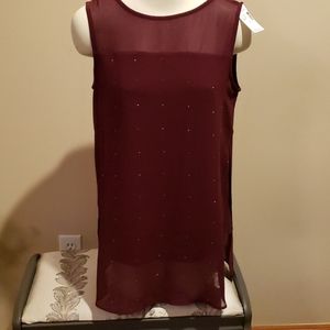 Sleeveless lined tunic blouse with embellishment